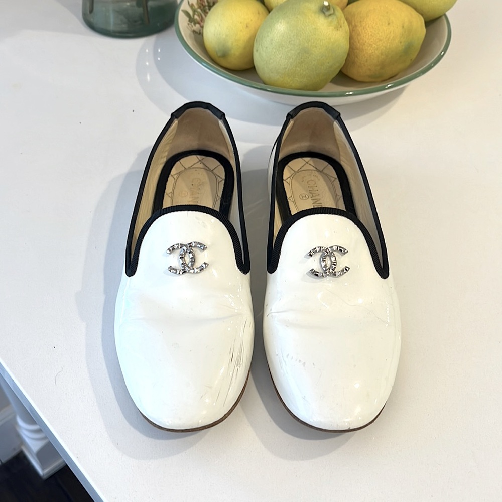 Chanel white slip on flats